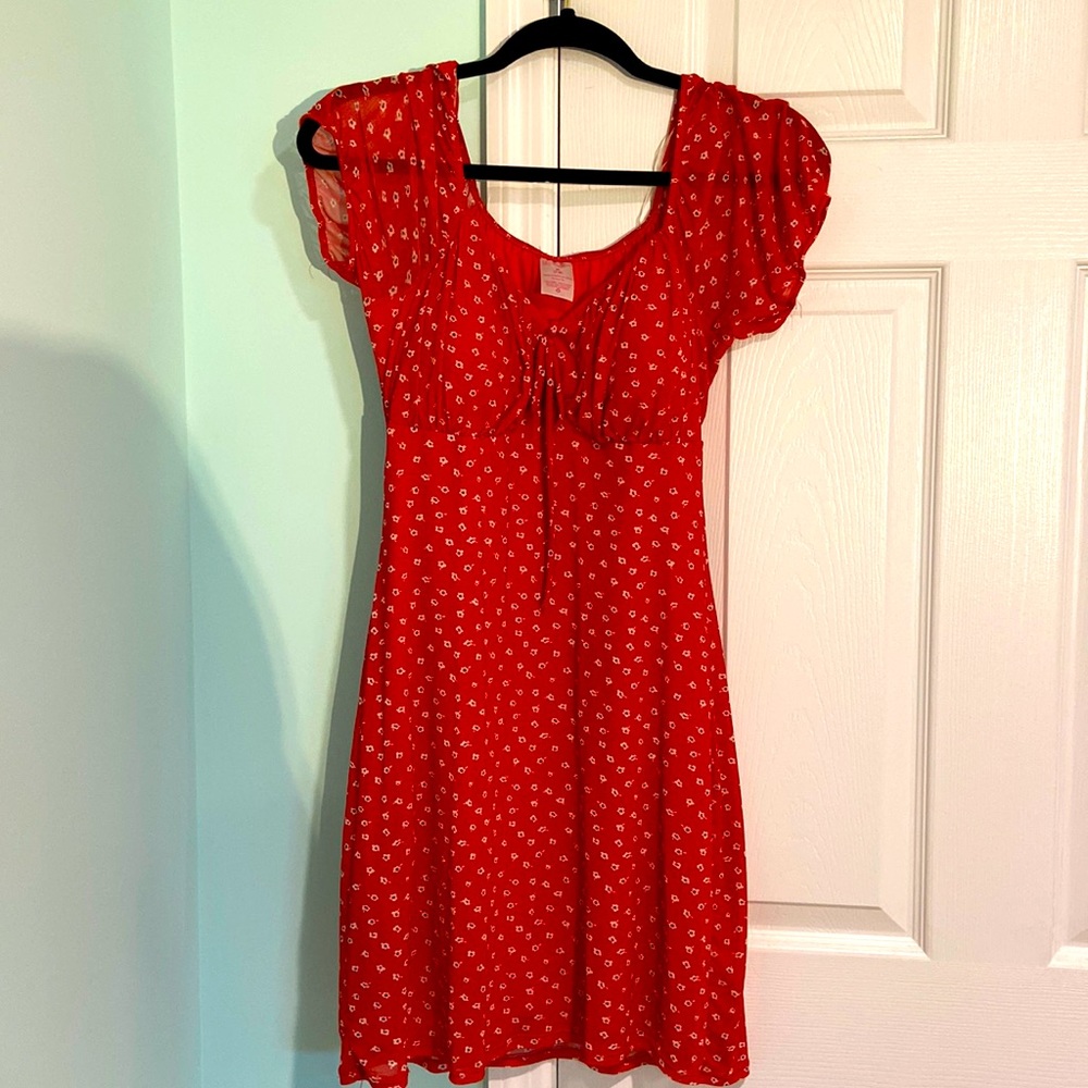 A simple red dress with flowers.